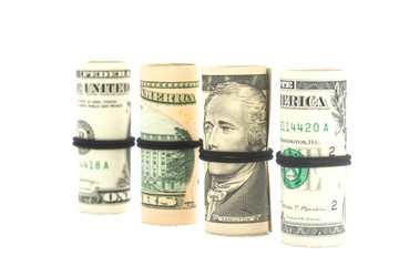 Rolls of dollars are isolated on a white background
