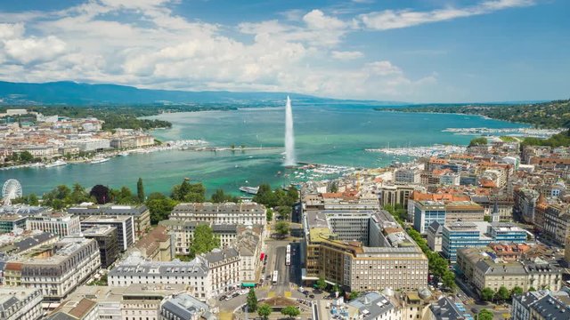 flight over geneva city center sunny day lakeside aerial panorama 4k timelapse switzerland