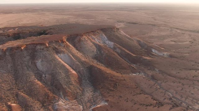 Aerial: Footage of Coober Pedy Breakaways. Tourism South Australia. Outback roadtrip.