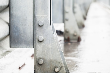 Gray metal structures connected with bolts