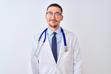 Fototapeta premium Young doctor man wearing stethoscope over isolated background smiling looking to the side and staring away thinking.