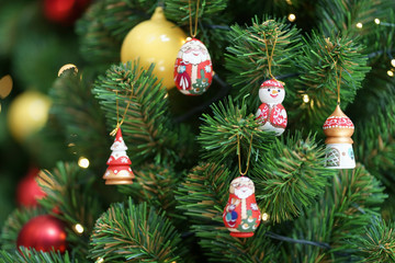 Christmas decoration ornaments. Seasonal souvenir from Russia with soft focus on the snowman.