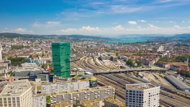 flight over zurich city train station traffic sunny day aerial panorama 4k timelapse switzerland 