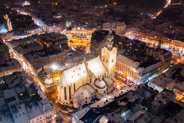 Aerial view on Latin cathedral in winter Lviv from drone
