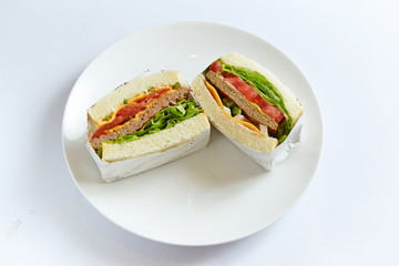 sandwich with ham and vegetables