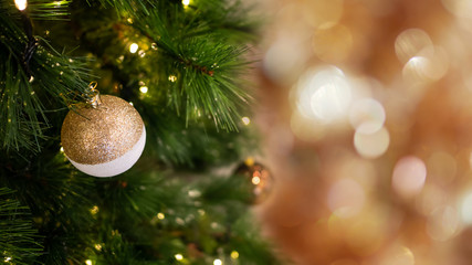 Christmas tree with decorations and lights background