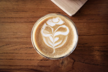 A cup of coffee with latte art on top