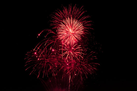 Red Fireworks On Black Background For Winter And New Year Festivals
