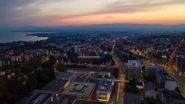 sunset sky night illumination lausanne city traffic aerial panorama 4k timelapse switzerland