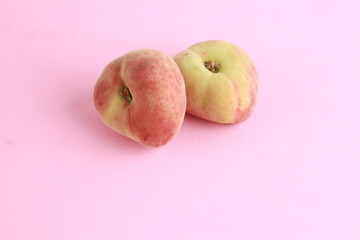 Paraguayan peach on colorful background