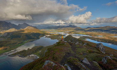 Beautiful nature landscape with people, lake and mountains, Scotland