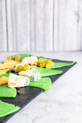 cheese platter on a cutting Board