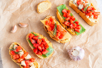 Italian bruschetta with cheese and tomatoes