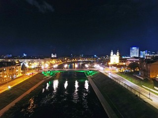Fototapeta na wymiar Gediminas' tower and Vilnius downtown at night. Drone footage.