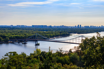 View on pedestrian bridge across the Dnieper river in Kiev, Ukraine