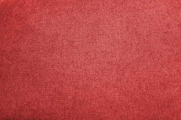 Closeup red color fabric sample texture backdrop. Fabric for decoration interior design or abstract background.