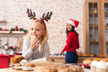 Child holding a lollipop in her hand