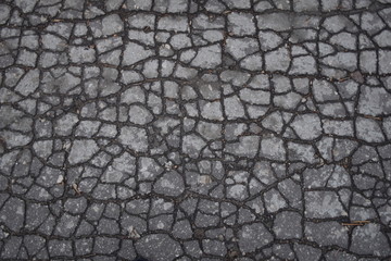 Background and texture. Cracked asphalt.