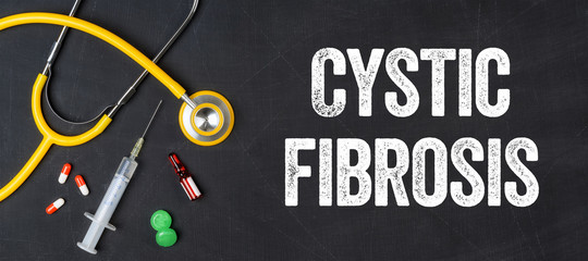 Stethoscope and pharmaceuticals on a blackboard - Cystic Fibrosis