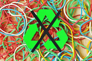 Do Not Recycle Symbol on rubber elastic band background - Concept of non recyclable items and materials