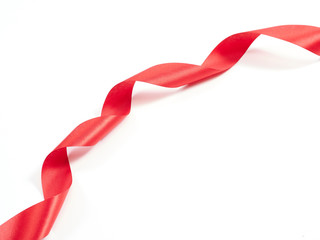 Red ribbon curved isolated on white