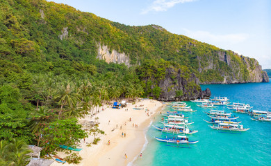 Aerial view of 7 Commando Beach on paradise island, tropical travel destination, El Nido, Palawan,...