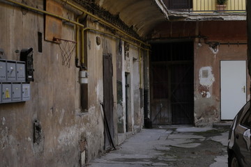 Fototapeta na wymiar Urban abandoned alley houses