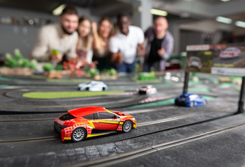 Models of race cars on track