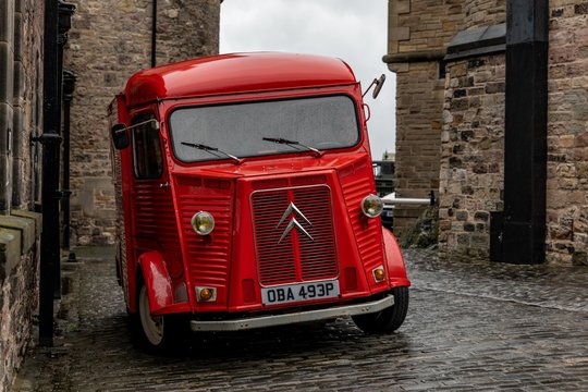 Legendary French Citroen Type H van in interesting red colour at the area of Edinburgh Castle