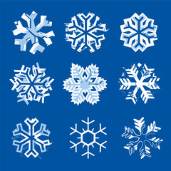   Grunge expressive whhite Snowflakes. Set of nine grunge stylized snowflakes. Isolated on blue background. Vector available.
