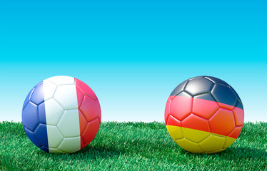 Two soccer balls in flags colors on green grass. France and Germany. 3d image