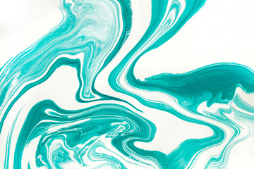 Mint green and white paint marbling flow background.