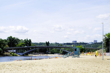 View of the pedestrian bridge, summer in the metropolis