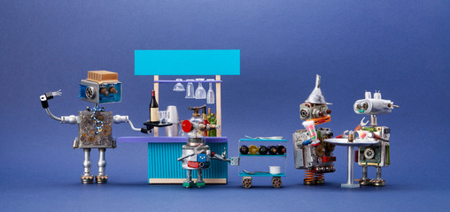 Robotic bar service. Toy robot bartender tray wine bottle and glasses. Small cyborg with waiter trolley. Two steampunk guests are drinking cocktails. Blue background.