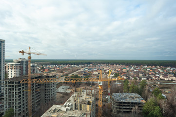 V. Chornovola street, city Brovary, country Ukraine -30.11.2019: city landscape. high-rise building construction.