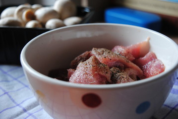Fresh meat cubes with black pepper powder - preparing for goulash