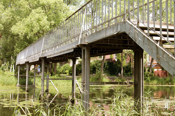  Metallic foot bridge over the river.