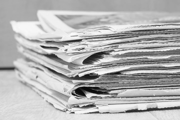 Newspaper Pages Stacked in Pile, Close up    