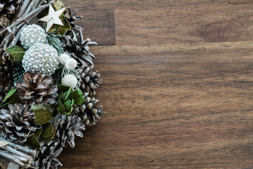 Christmas decoration on a rustic brown wooden background