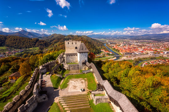 Celje Old castle (Celjski Stari grad), amazing aerial view of medieval fortification and town of Celje in Lasko valley in Julian Alps mountains, Slovenia, Styria. Outdoor travel background