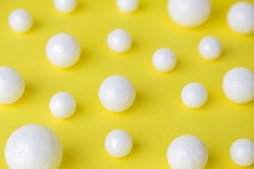 Abstract with foam bubbles on yellow minimalistic surreal concept.