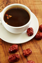 Chinese herbal medicine drink in white cup 
