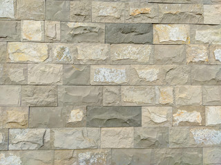 New and modern stone rock brick wall with rough texture and interesting pattern for solid background wallpaper