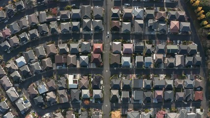 Aerial dolly shot of a neatly organized suburban neighborhood in Kusatsu, Shiga, Japan.