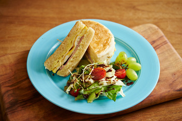 English muffin sandwich with salad 