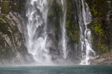 Fototapeta na wymiar Waterfall at Milford Sound