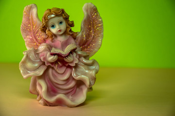 angel on a green background