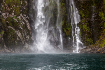 Fototapeta na wymiar Waterfall at Milford Sound