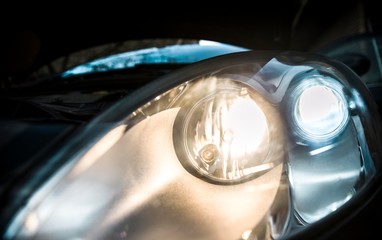 car headlights with halogen high beam and led low beam.
