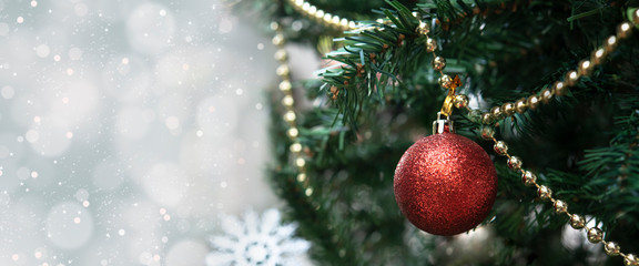 Fototapeta na wymiar Christmas tree with decorations and light bokeh background. for Christmas and Happy New Year 2020. header and cover.